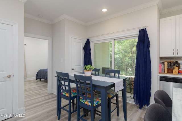 13 High Hills Dr, Hattiesburg, MS 39402 - dining space with light wood finished floors, crown molding, baseboards, and recessed lighting