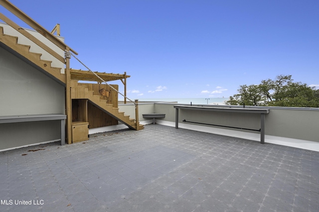 80 E Beach St Unit 4, Gulfport, MS 39507 - view of patio / terrace with stairs and a water view