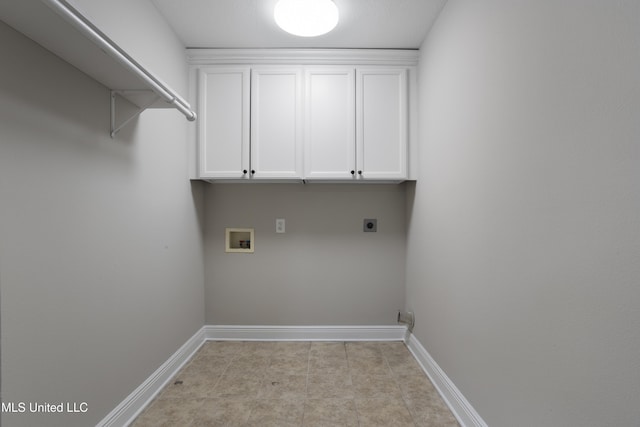 80 E Beach St Unit 4, Gulfport, MS 39507 - washroom with cabinet space, washer hookup, baseboards, and electric dryer hookup