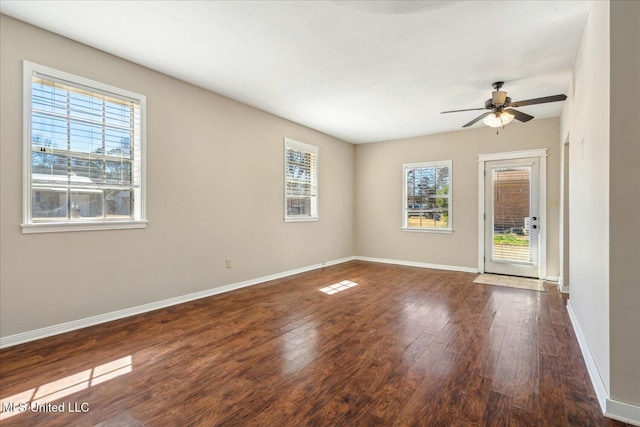 310 Lafayette St, Senatobia, MS 38668 - spare room with a ceiling fan, baseboards, a wealth of natural light, and wood finished floors