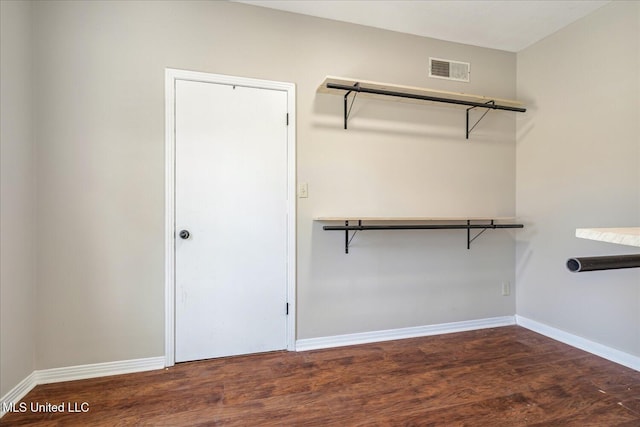 310 Lafayette St, Senatobia, MS 38668 - spacious closet featuring visible vents and wood finished floors