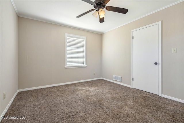 310 Lafayette St, Senatobia, MS 38668 - unfurnished room with baseboards, visible vents, a ceiling fan, ornamental molding, and carpet flooring