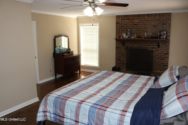 bedroom featuring ceiling fan, baseboards, crown molding, and wood finished floors