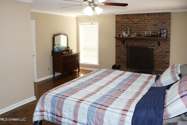 bedroom featuring ceiling fan, wood finished floors, baseboards, and ornamental molding