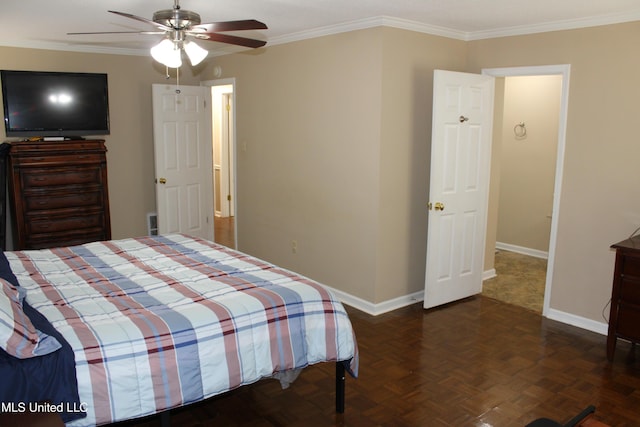 bedroom with crown molding, baseboards, and a ceiling fan