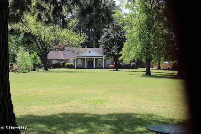 exterior space featuring a front yard