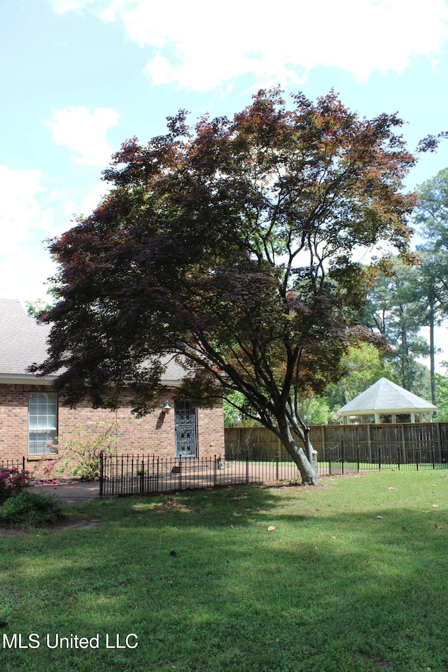 view of yard featuring fence private yard