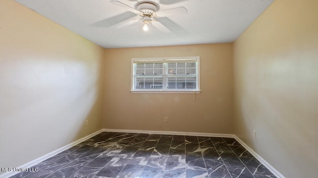 unfurnished room featuring ceiling fan