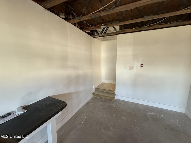 unfinished basement with baseboards