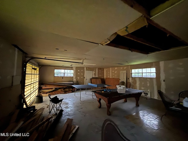 4805 Washington Ave, Gulfport, MS 39507 - miscellaneous room with a garage, healthy amount of natural light, concrete flooring, and billiards table