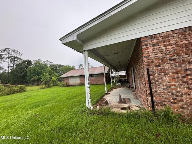 4805 Washington Ave, Gulfport, MS 39507 - view of green lawn with a patio area