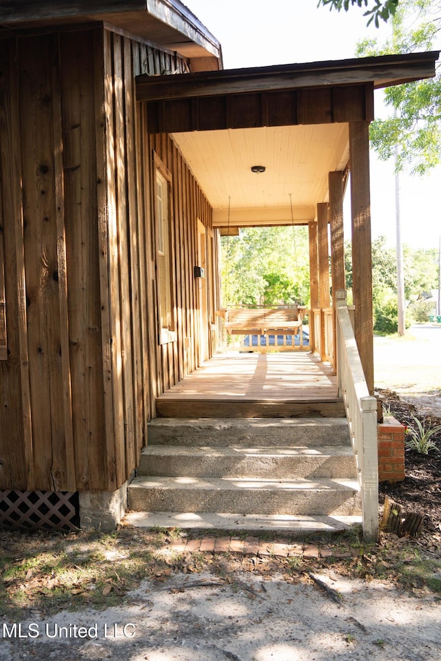 wooden deck with a porch