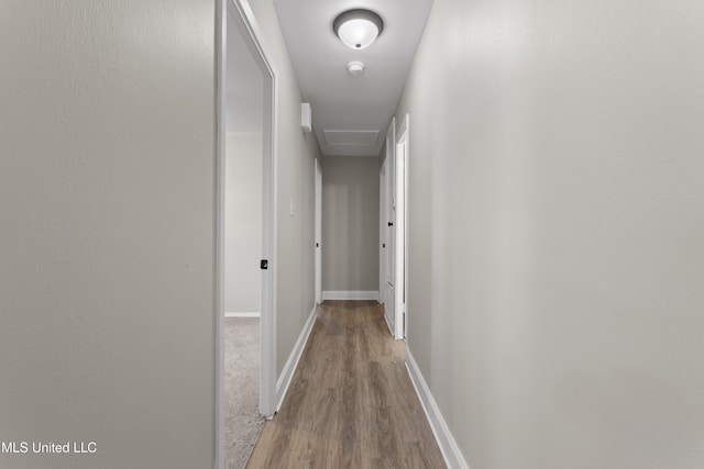 449 Klondyke Rd, Long Beach, MS 39560 - corridor featuring attic access, wood finished floors, and baseboards