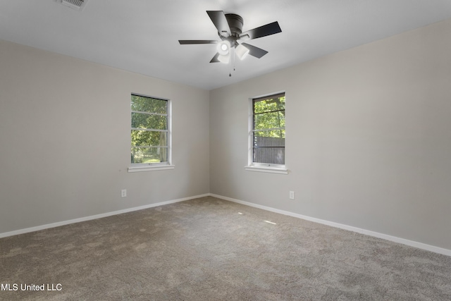 449 Klondyke Rd, Long Beach, MS 39560 - carpeted spare room featuring baseboards and a ceiling fan