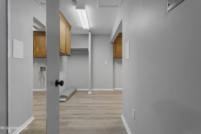 449 Klondyke Rd, Long Beach, MS 39560 - laundry room featuring light wood finished floors and baseboards