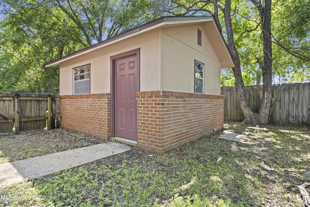 449 Klondyke Rd, Long Beach, MS 39560 - view of outdoor structure with an outbuilding and a fenced backyard