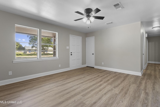 449 Klondyke Rd, Long Beach, MS 39560 - unfurnished room with light wood finished floors, baseboards, and visible vents