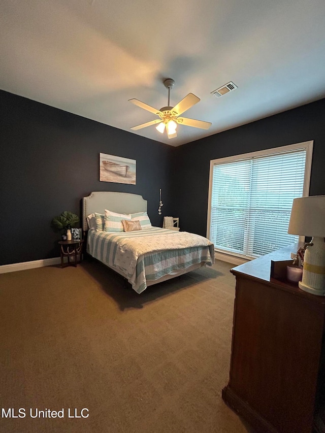 bedroom featuring ceiling fan and carpet flooring