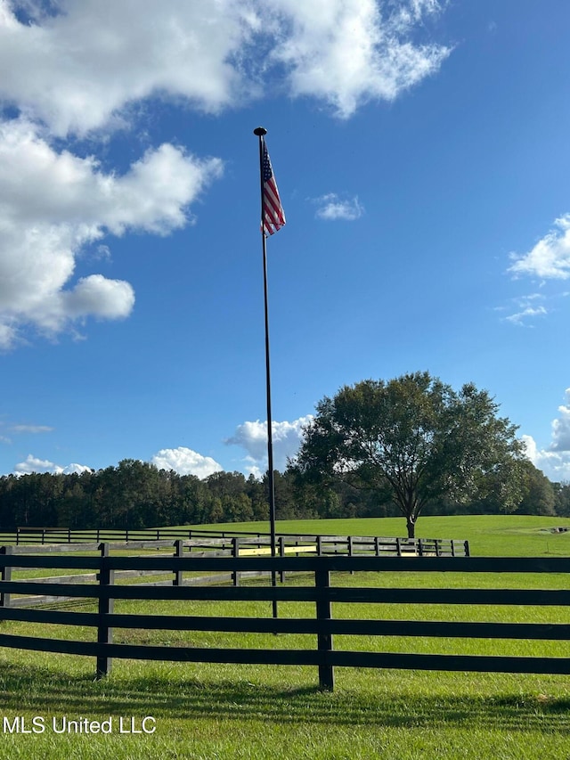 exterior space with a rural view