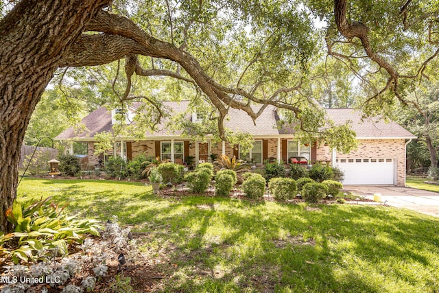 1344 Diller Rd, Ocean Springs, MS 39564 - view of front of property with brick siding, concrete driveway, a garage, and a shingled roof