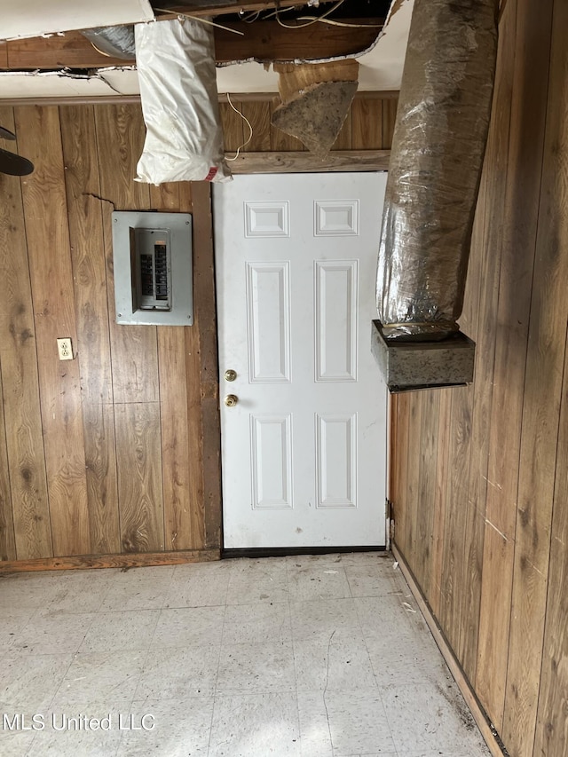 514 Lincoln Ave, Indianola, MS 38751 - foyer entrance featuring light flooring, wooden walls, and electric panel