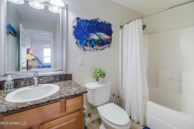 full bathroom featuring shower / bathtub combination with curtain, vanity, and toilet