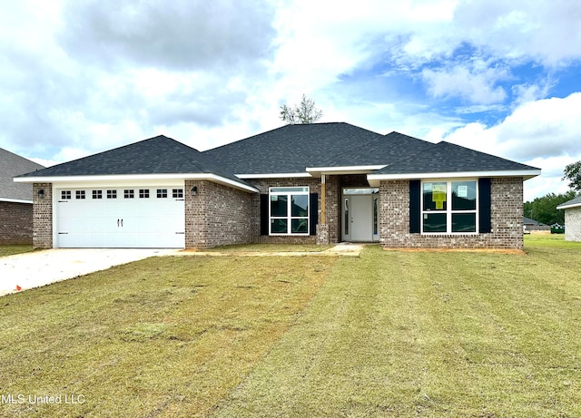 view of front facade featuring a garage and a front lawn