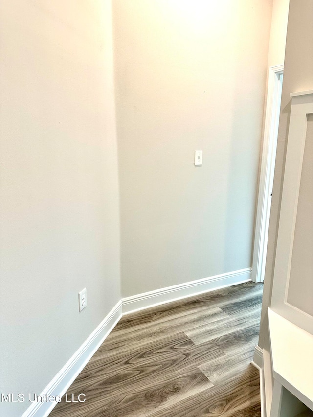 unfurnished room featuring hardwood / wood-style flooring