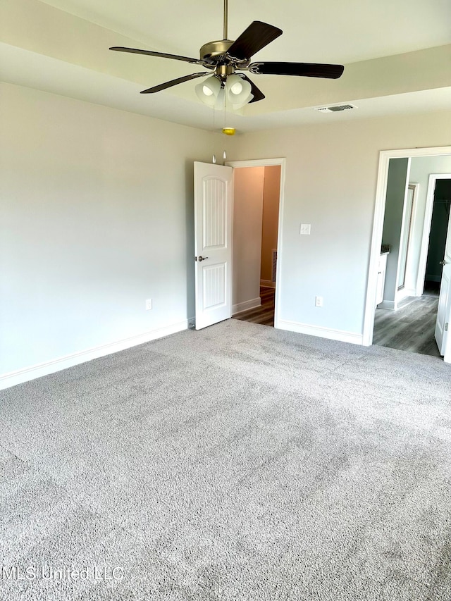 unfurnished room featuring carpet flooring and ceiling fan