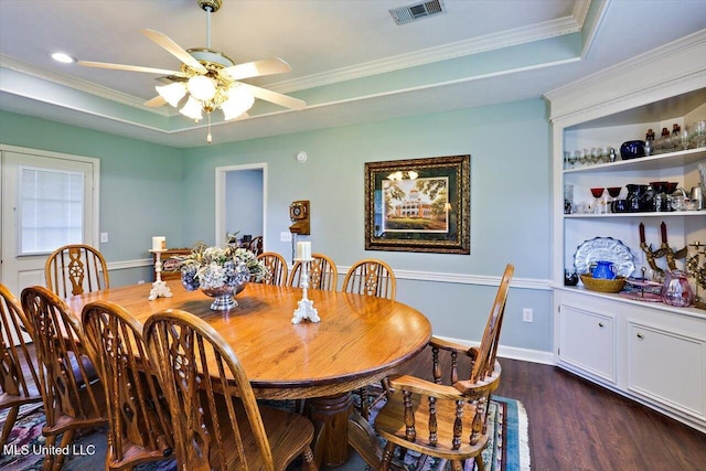 206 Southwind Dr, Richland, MS 39218 - dining room featuring dark wood-style floors, a raised ceiling, ceiling fan, ornamental molding, and recessed lighting