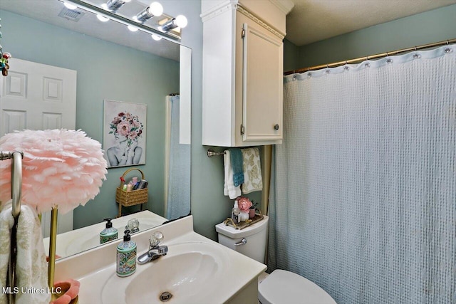206 Southwind Dr, Richland, MS 39218 - bathroom featuring toilet and vanity