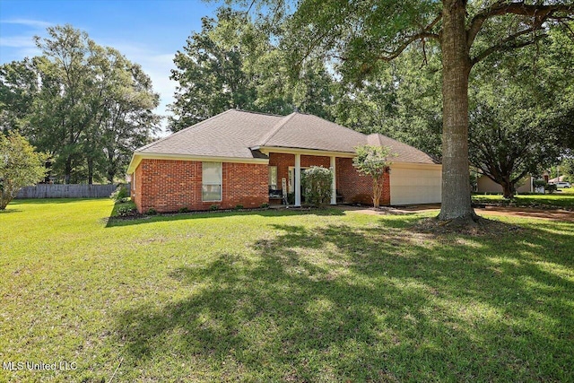 206 Southwind Dr, Richland, MS 39218 - view of front of house with a garage and brick siding