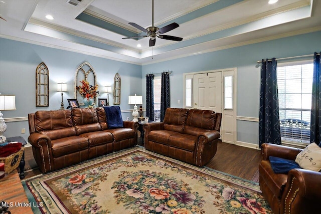 206 Southwind Dr, Richland, MS 39218 - living room featuring wood finished floors, a raised ceiling, ceiling fan, and ornamental molding