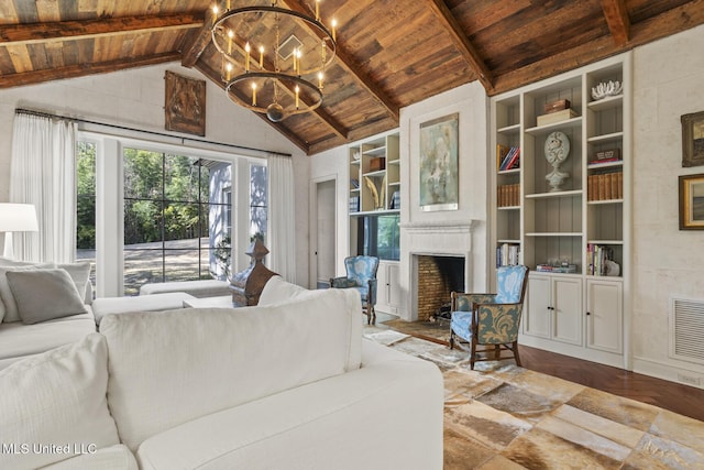 living room featuring wood ceiling, a chandelier, lofted ceiling with beams, and built in features