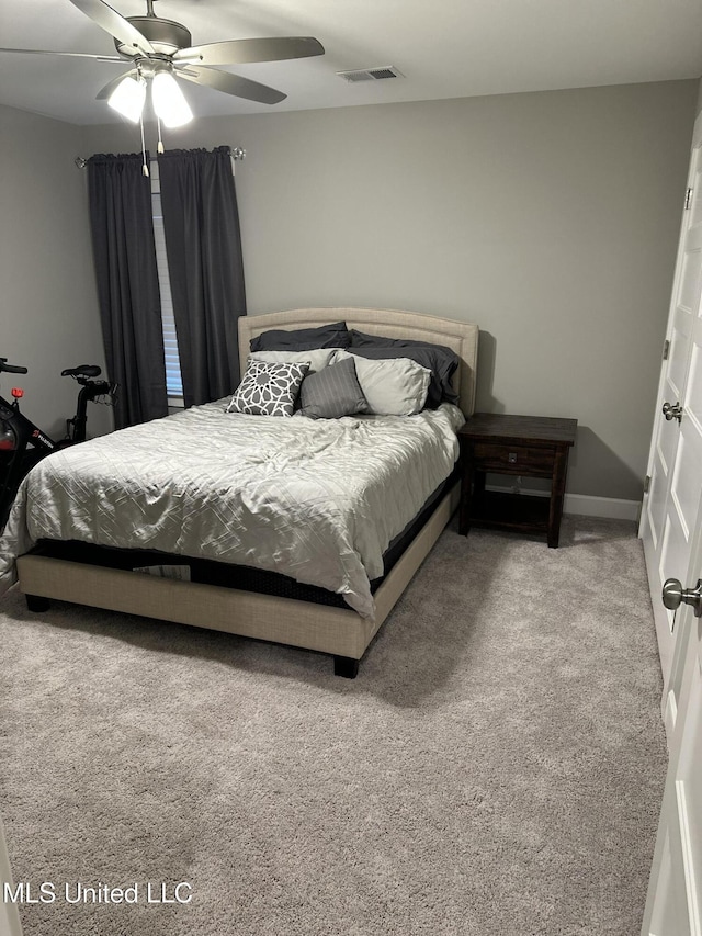 carpeted bedroom featuring ceiling fan