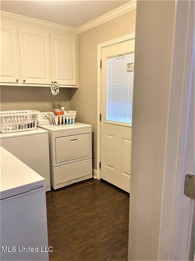 210 Jefferson Davis Blvd, Natchez, MS 39120 - clothes washing area with cabinet space, washer and clothes dryer, ornamental molding, and dark wood-type flooring