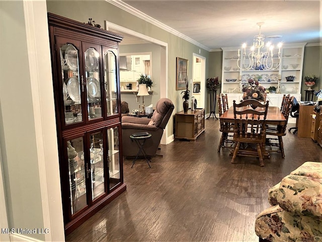 210 Jefferson Davis Blvd, Natchez, MS 39120 - dining area with a chandelier, dark wood-style floors, ornamental molding, and built in features