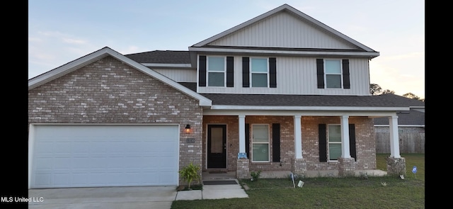 craftsman house with a porch and a garage