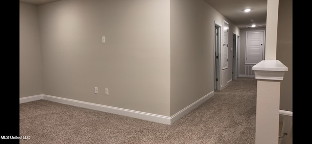 corridor featuring carpet floors