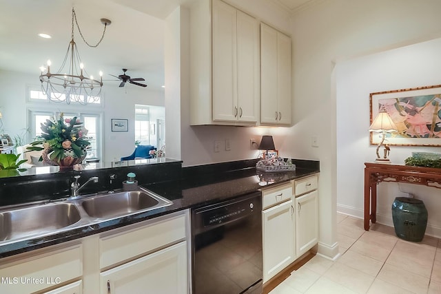 kitchen with white cabinetry, dishwasher, hanging light fixtures, and a sink