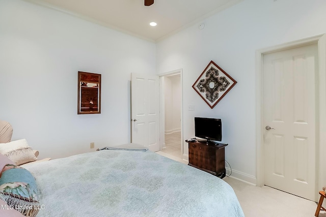 bedroom with crown molding, recessed lighting, a ceiling fan, light carpet, and baseboards