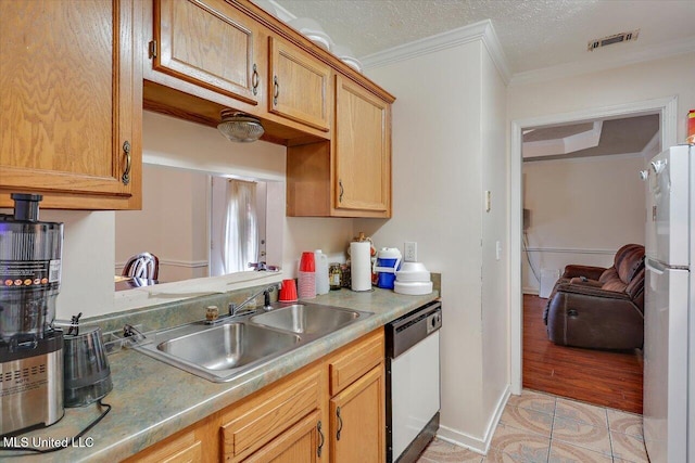 2120 Meagan Dr, Byram, MS 39272 - kitchen featuring dishwasher, freestanding refrigerator, ornamental molding, light tile patterned floors, and light countertops