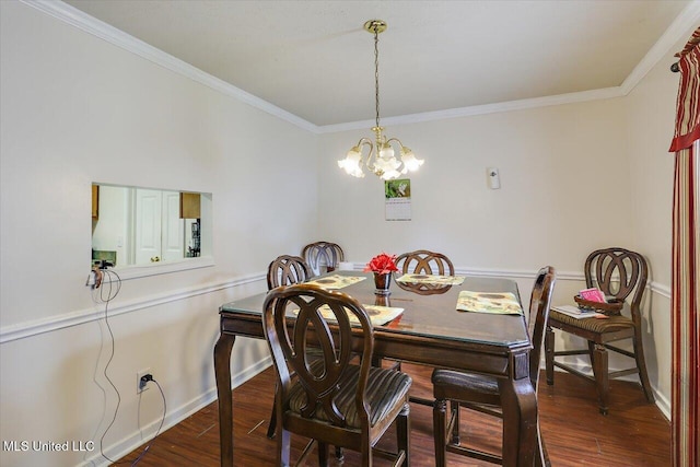 2120 Meagan Dr, Byram, MS 39272 - dining room with crown molding, dark wood-style flooring, and a chandelier