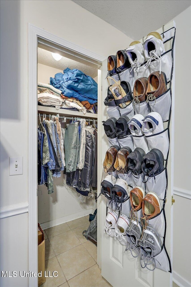 2120 Meagan Dr, Byram, MS 39272 - spacious closet featuring tile patterned floors