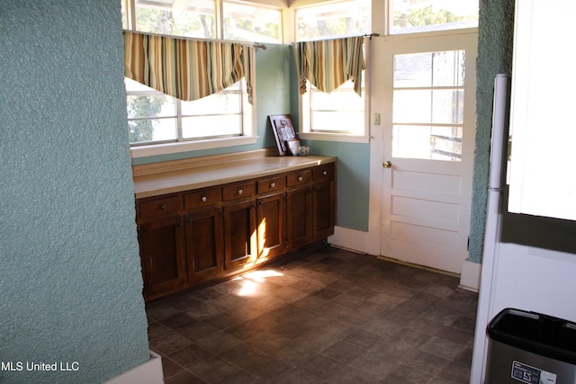 245 E College Ave, Holly Springs, MS 38635 - kitchen with plenty of natural light and light countertops