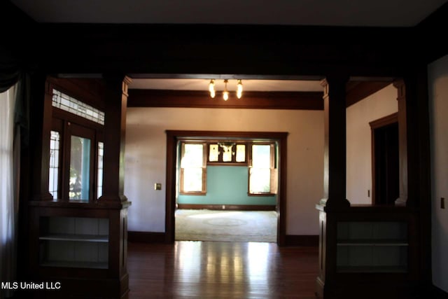 245 E College Ave, Holly Springs, MS 38635 - foyer entrance featuring wood finished floors, plenty of natural light, and baseboards