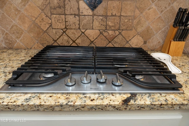 105 Bridgeton Way, Canton, MS 39046 - kitchen view of stainless steel gas cooktop, backsplash, and light countertops