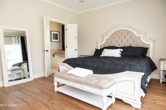 105 Bridgeton Way, Canton, MS 39046 - bedroom featuring wood finished floors, crown molding, and ensuite bathroom