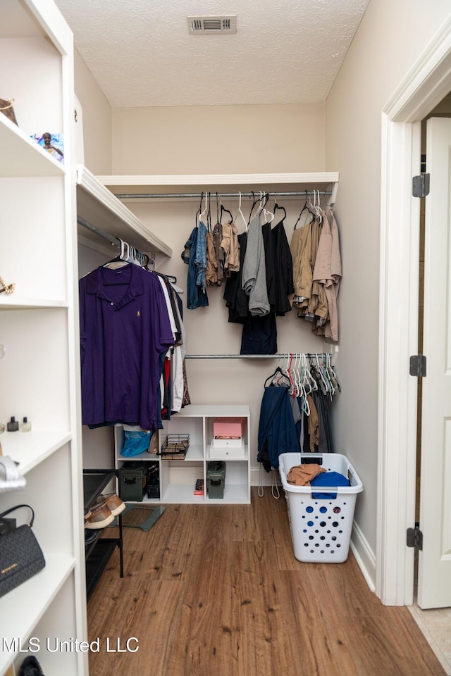 105 Bridgeton Way, Canton, MS 39046 - walk in closet featuring wood finished floors