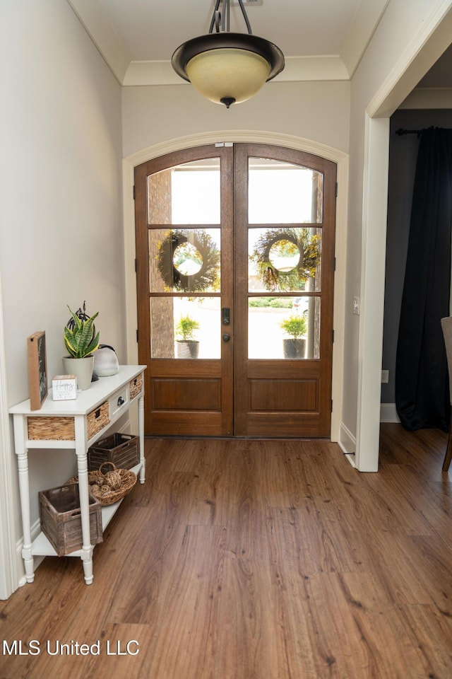 105 Bridgeton Way, Canton, MS 39046 - foyer featuring wood finished floors, healthy amount of natural light, ornamental molding, and french doors